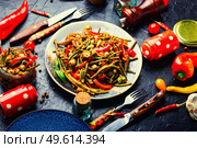 Spicy vegetable appetizer made from pepper, asparagus beans, tomato and capers. Spicy vegetable appetizer. Стоковое фото, агентство Ingram Publishing / Фотобанк Лори