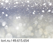 christmas lights bokeh defocused light silver gray background. christmas lights defocused background. Стоковое фото, агентство Ingram Publishing / Фотобанк Лори