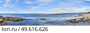 Panoramic view of sailing boat moored in clear water at Ronachan Point, Kintyre off the West coast of Scotland. Стоковое фото, агентство Ingram Publishing / Фотобанк Лори