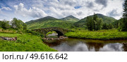 Panoramic view of Butter Bridge over Kinglas Water in the Loch Lomond National Park,Scotland. Стоковое фото, агентство Ingram Publishing / Фотобанк Лори