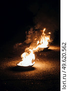 light up the night fire show with the participation of the people, light, and open fire. Стоковое фото, агентство Ingram Publishing / Фотобанк Лори
