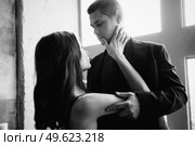 the girl reaches for the guy and he holds her hand. Стоковое фото, агентство Ingram Publishing / Фотобанк Лори