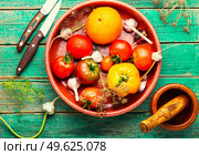 Salted homemade tomato.Cooking process.Canned tomato.Marinated vegetable.Preparation for pickling tomato. Raw tomato,preservation of tomatoes. Стоковое фото, агентство Ingram Publishing / Фотобанк Лори