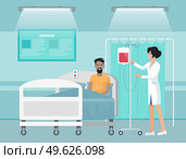 Patient making blood transfusion lying on bed in hospital. Nurse or medical assistant check pack with blood at rack. Therapy for young smiling man. Treatment in hospital. Medical healthcare concept. Patient making blood transfusion lying on bed in hospital, medical assistant check pack with blood. Стоковая иллюстрация, агентство Ingram Publishing / Фотобанк Лори