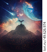 Fantastic creature with angel wings on the top of a mountain against marvelous cosmic sky background. Surreal scene with a celestial messenger or space guardian watching the horizon. Стоковое фото, агентство Ingram Publishing / Фотобанк Лори