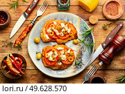 Schnitzel, breaded and fried thin layer of meat. Austrian dish. Schnitzel with olives and tomato. Стоковое фото, агентство Ingram Publishing / Фотобанк Лори