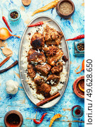 Spicy vindaloo meat with rice. Pork cooked in spicy garlic sauce. Vindaloo, meat in roast spices. Стоковое фото, агентство Ingram Publishing / Фотобанк Лори