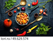 Gravy with meat,mushrooms,zucchini and potatoes.Stew meat in stewpan. Ragout with meat and vegetables. Стоковое фото, агентство Ingram Publishing / Фотобанк Лори