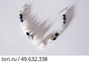 jewel handmade bracelet with semipreciouse stones at white  background. Стоковое фото, агентство Ingram Publishing / Фотобанк Лори