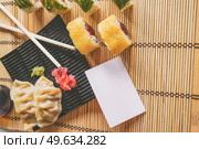Fushion food of modern california roll and gyoza. Стоковое фото, агентство Ingram Publishing / Фотобанк Лори