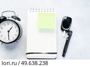 Diabetes diet planning concept, set of watch, notepad and glukometr. Diabetes diet planning concept. Стоковое фото, агентство Ingram Publishing / Фотобанк Лори