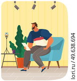 Young guy communicates with friend via video call. Working video communication, online talk. Man watching video, podcast on smartphone. Virtual communication via Internet. Online broadcasting concept. Man watching video, podcast, broadcast on smartphone screen. Virtual communication via Internet. Стоковая иллюстрация, агентство Ingram Publishing / Фотобанк Лори