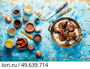 Spicy vindaloo meat with rice. Pork cooked in spicy garlic sauce. Vindaloo, meat in roast spices. Стоковое фото, агентство Ingram Publishing / Фотобанк Лори