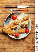 Appetizing food, scomber baked in spicy dough.. Mackerel baked in bread loaf. Стоковое фото, агентство Ingram Publishing / Фотобанк Лори