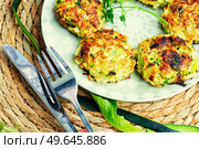 Vegan cutlets from zucchini, oatmeal and greens.. Dietary zucchini cutlets. Стоковое фото, агентство Ingram Publishing / Фотобанк Лори