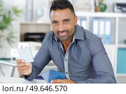 interior designer working with wood colours swatches. Стоковое фото, агентство Ingram Publishing / Фотобанк Лори