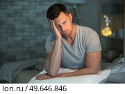 handsome man suffering insomnia cannot sleep. Стоковое фото, агентство Ingram Publishing / Фотобанк Лори