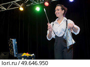 woman magician in funny concept. Стоковое фото, агентство Ingram Publishing / Фотобанк Лори