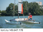 a man sailing for relaxation. Стоковое фото, агентство Ingram Publishing / Фотобанк Лори