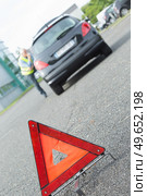 warning triangle behind stalled car. Стоковое фото, агентство Ingram Publishing / Фотобанк Лори