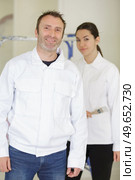 young house painters and decorators apprentice trainee. Стоковое фото, агентство Ingram Publishing / Фотобанк Лори