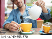 a man drinking chinese tea. Стоковое фото, агентство Ingram Publishing / Фотобанк Лори