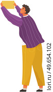 Young man stands and holds orange card on white background. Character wearing sweater and yellow pants. Programmer completes tasks, solves cases and works. Vector illustration of busy person. Young man stands and holds orange card on white background. Programmer works, completes tasks. Стоковая иллюстрация, агентство Ingram Publishing / Фотобанк Лори