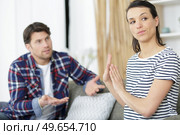 woman ignoring her partner after an argument. Стоковое фото, агентство Ingram Publishing / Фотобанк Лори