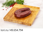 Delicious dry cured beef basturma on table, closeup. Стоковое фото, фотограф Андрей Старостин / Фотобанк Лори