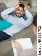 upset man having unpleasant talk with a professional. Стоковое фото, агентство Ingram Publishing / Фотобанк Лори