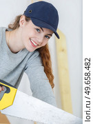 portrait of beautiful young female carpenter. Стоковое фото, агентство Ingram Publishing / Фотобанк Лори