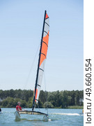 sailing on a lake - summer and sports theme. Стоковое фото, агентство Ingram Publishing / Фотобанк Лори