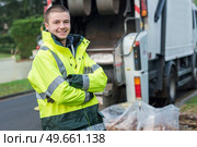 portrait of young smiling refuse collector. Стоковое фото, агентство Ingram Publishing / Фотобанк Лори