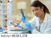 dental technician looking at the camera. Стоковое фото, агентство Ingram Publishing / Фотобанк Лори