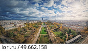 Panoramic view to the Paris cityscape from the Eiffel tower heights, France. Montparnasse tower and Les Invalides seen on the horizon panorama. Стоковое фото, агентство Ingram Publishing / Фотобанк Лори