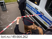 Работа следственно-оперативной группы на месте преступления в городе Москве, Россия. Редакционное фото, фотограф Николай Винокуров / Фотобанк Лори