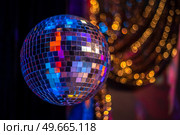 disco ball in a nightclub. A party. Стоковое фото, агентство Ingram Publishing / Фотобанк Лори