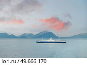 a ferry in the fjord connects the road. Norway. Стоковое фото, агентство Ingram Publishing / Фотобанк Лори