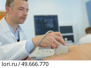 doctor and patient ultrasonography. Стоковое фото, агентство Ingram Publishing / Фотобанк Лори
