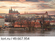 Scenic summer panorama of the Old Town architecture with Vltava river and St.Vitus Cathedral in Prague, Czech Republic. Стоковое фото, агентство Ingram Publishing / Фотобанк Лори