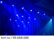 rays of light illuminate the scene at the concert. Стоковое фото, агентство Ingram Publishing / Фотобанк Лори