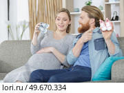 young parents expect a baby. Стоковое фото, агентство Ingram Publishing / Фотобанк Лори