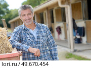Portrait of man on a ranch. Стоковое фото, агентство Ingram Publishing / Фотобанк Лори