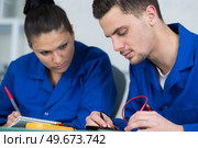 students in electronics class at university. Стоковое фото, агентство Ingram Publishing / Фотобанк Лори