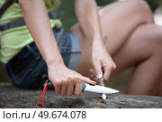 closeup of ma preparing a fire in nature. Стоковое фото, агентство Ingram Publishing / Фотобанк Лори