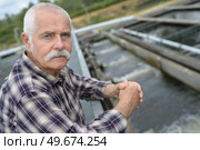 irrigate dam and water treatment machine against blue sky. Стоковое фото, агентство Ingram Publishing / Фотобанк Лори