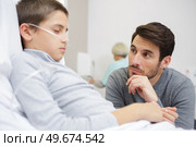 ittle boy sick in the hospital with saline intravenous iv. Стоковое фото, агентство Ingram Publishing / Фотобанк Лори