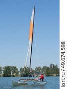 sailing on a lake - summer and sports theme. Стоковое фото, агентство Ingram Publishing / Фотобанк Лори