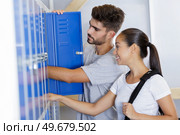 young couple in gyms locker room. Стоковое фото, агентство Ingram Publishing / Фотобанк Лори