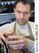 mending the sole. Стоковое фото, агентство Ingram Publishing / Фотобанк Лори
